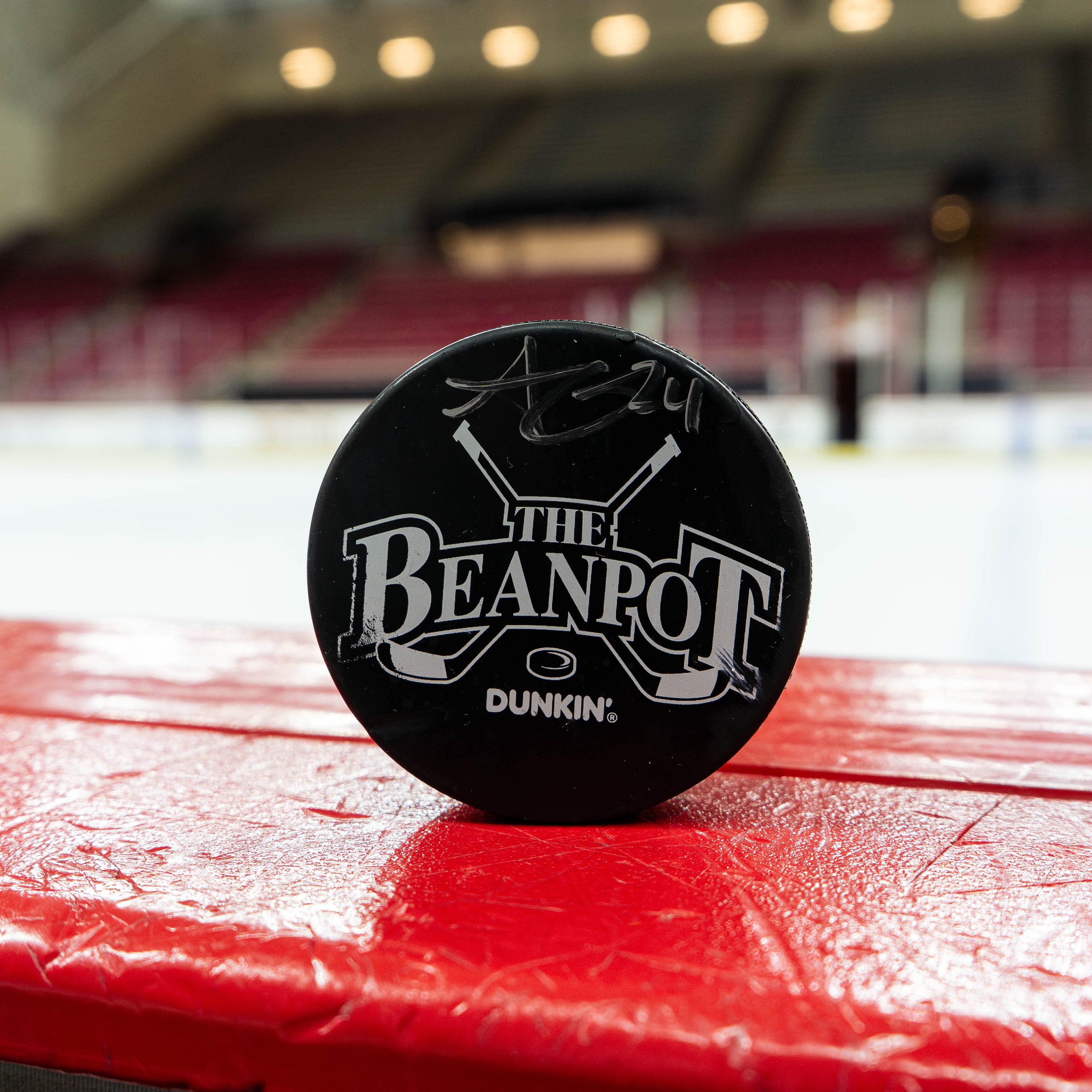 Goal Puck No. 1 Signed by Andre Gasseau
