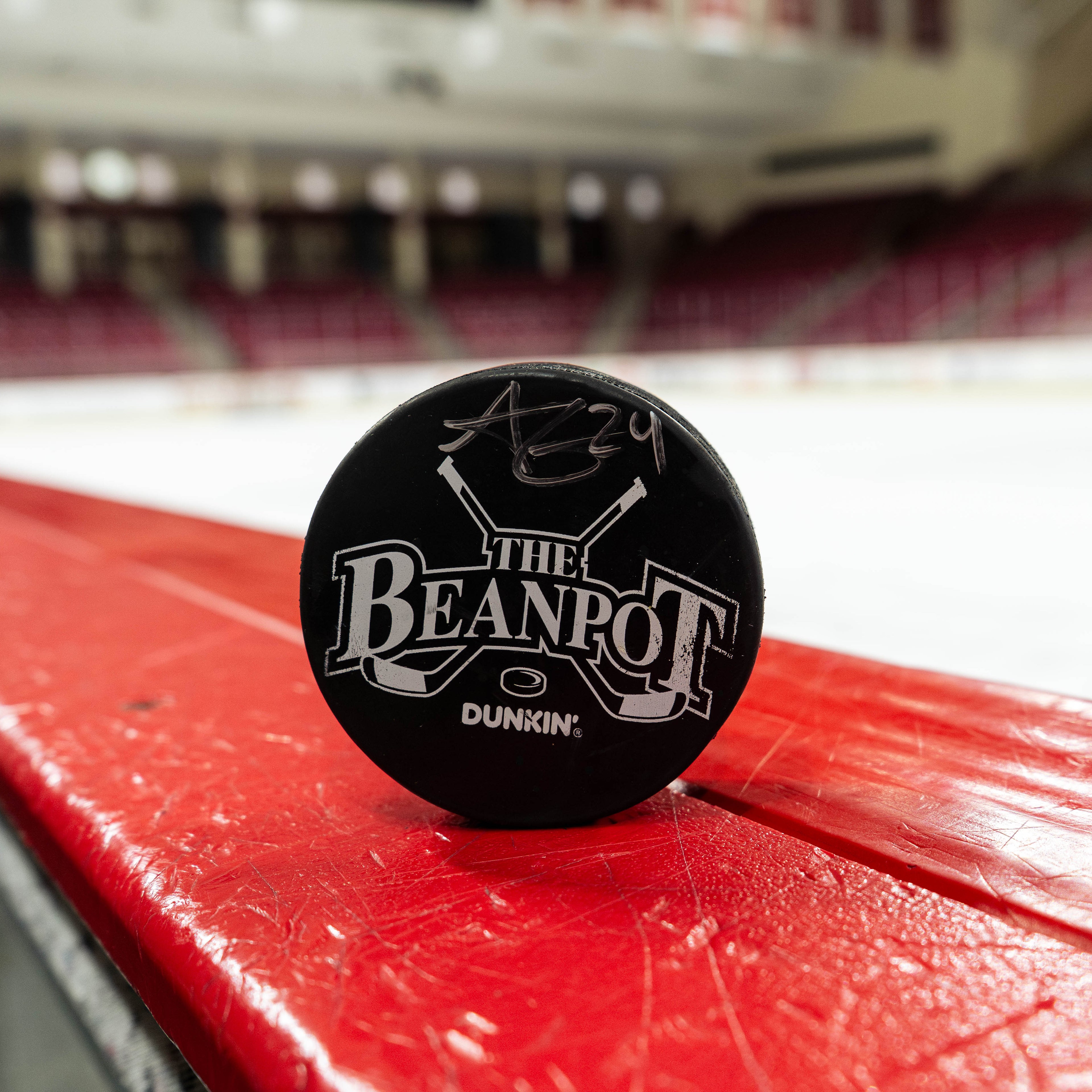 Goal Puck No. 4 Signed by Andre Gasseau 